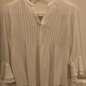 White flowy top